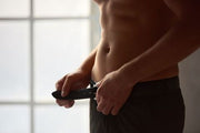 Man naked and unbuckled